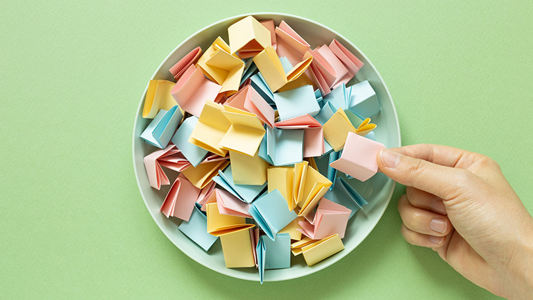 Bowl of Brightly Colored slips of paper, indicating bowl grab challenge