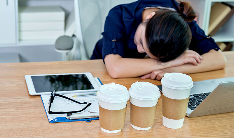 woman asleep at desk